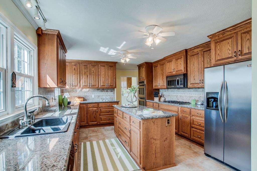 2052 Ridgecrest Circle Dickson, TN 37055 - Photo 13 of 30 Will you ever fill all these cabinets?