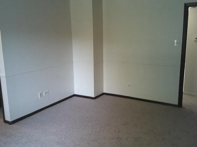 a view of a room with windows