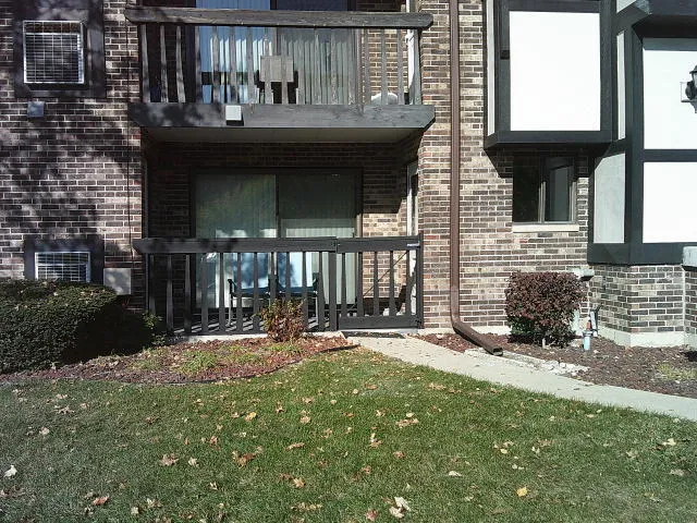 a front view of a house with patio