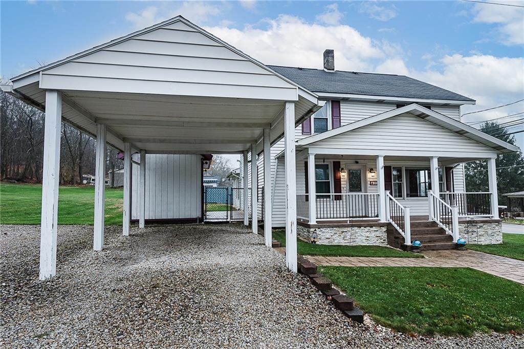 228 Harrison Avenue Robinson, PA 15949 - Photo 2 of 46 a house view with a garden space
