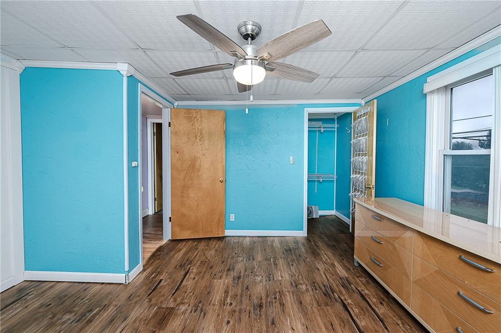 228 Harrison Avenue Robinson, PA 15949 - Photo 22 of 46 wooden floor in an empty room with a window