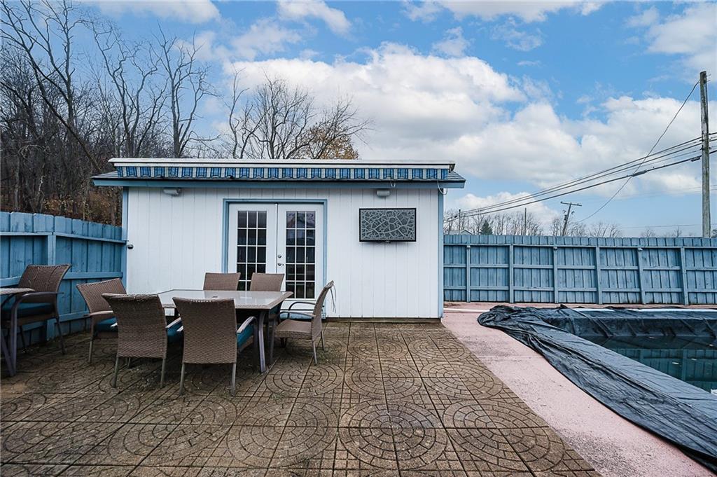 228 Harrison Avenue Robinson, PA 15949 - Photo 46 of 46 a backyard of a house with table and chairs