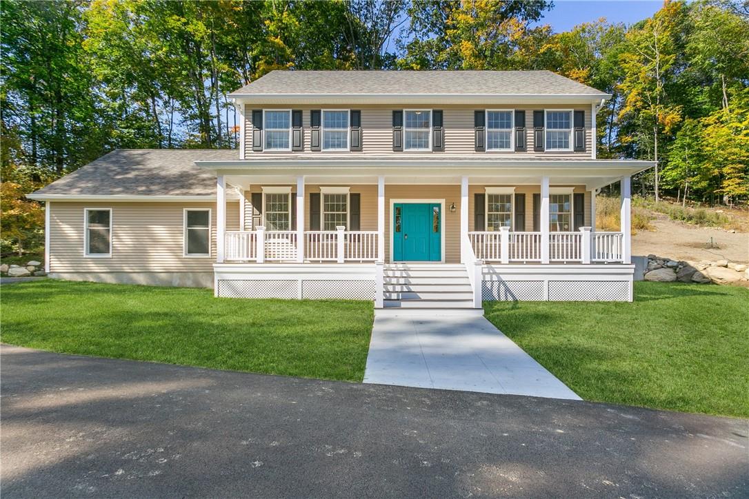16 Hickory Road Lincolndale, NY 10540 - Photo 1 of 1 a front view of a house with a yard and trees