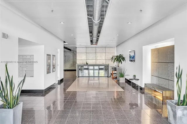 a view of livingroom with furniture and window