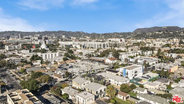 an aerial view of residential building and street