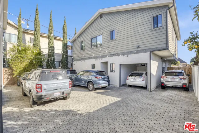 a car parked in front of a house