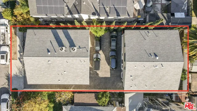 a view of a house with a trees from a balcony