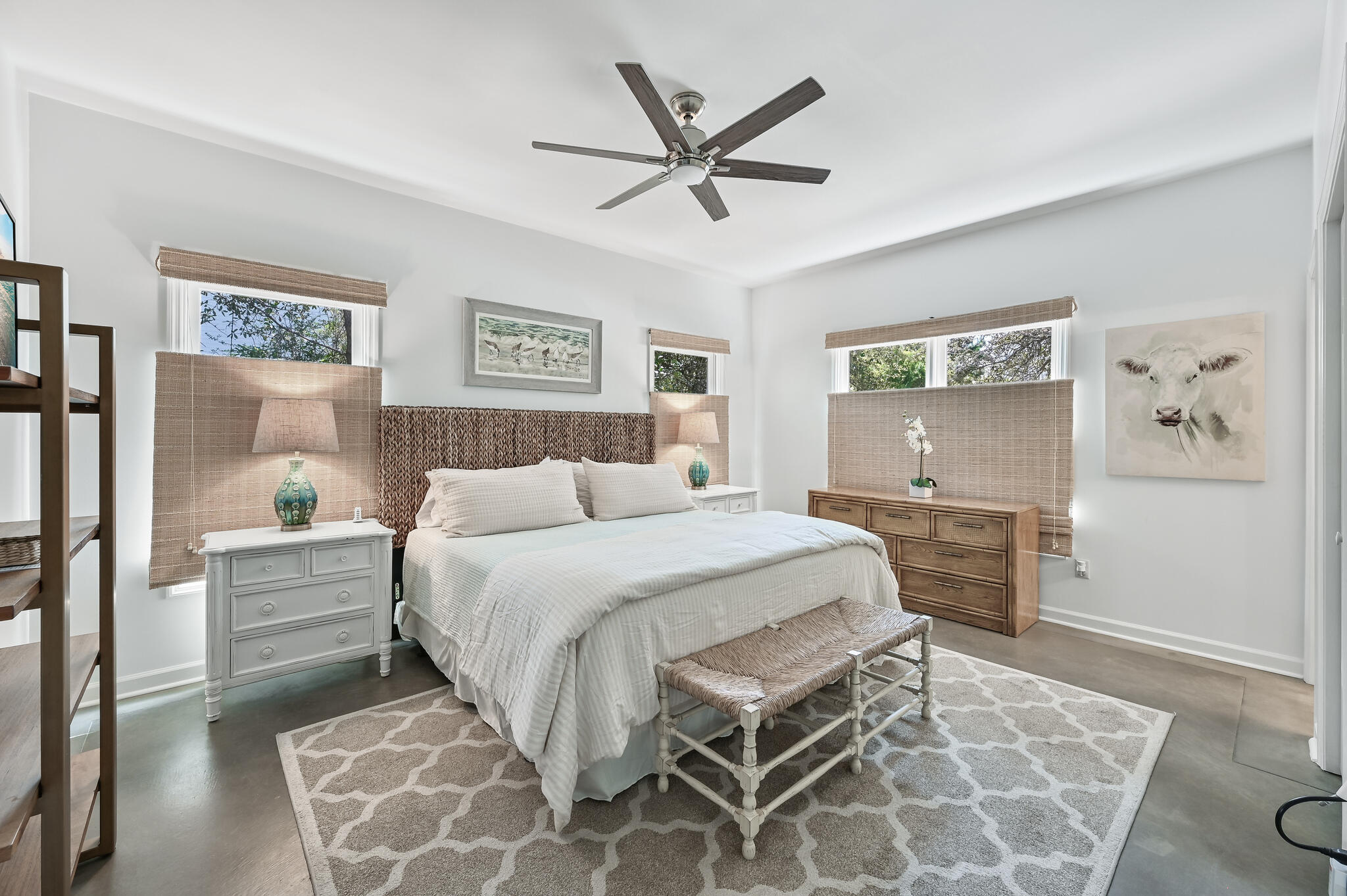 65 Cassine Way Santa Rosa Beach, FL 32459 - Photo 18 of 38 a spacious bedroom with a bed and a chandelier