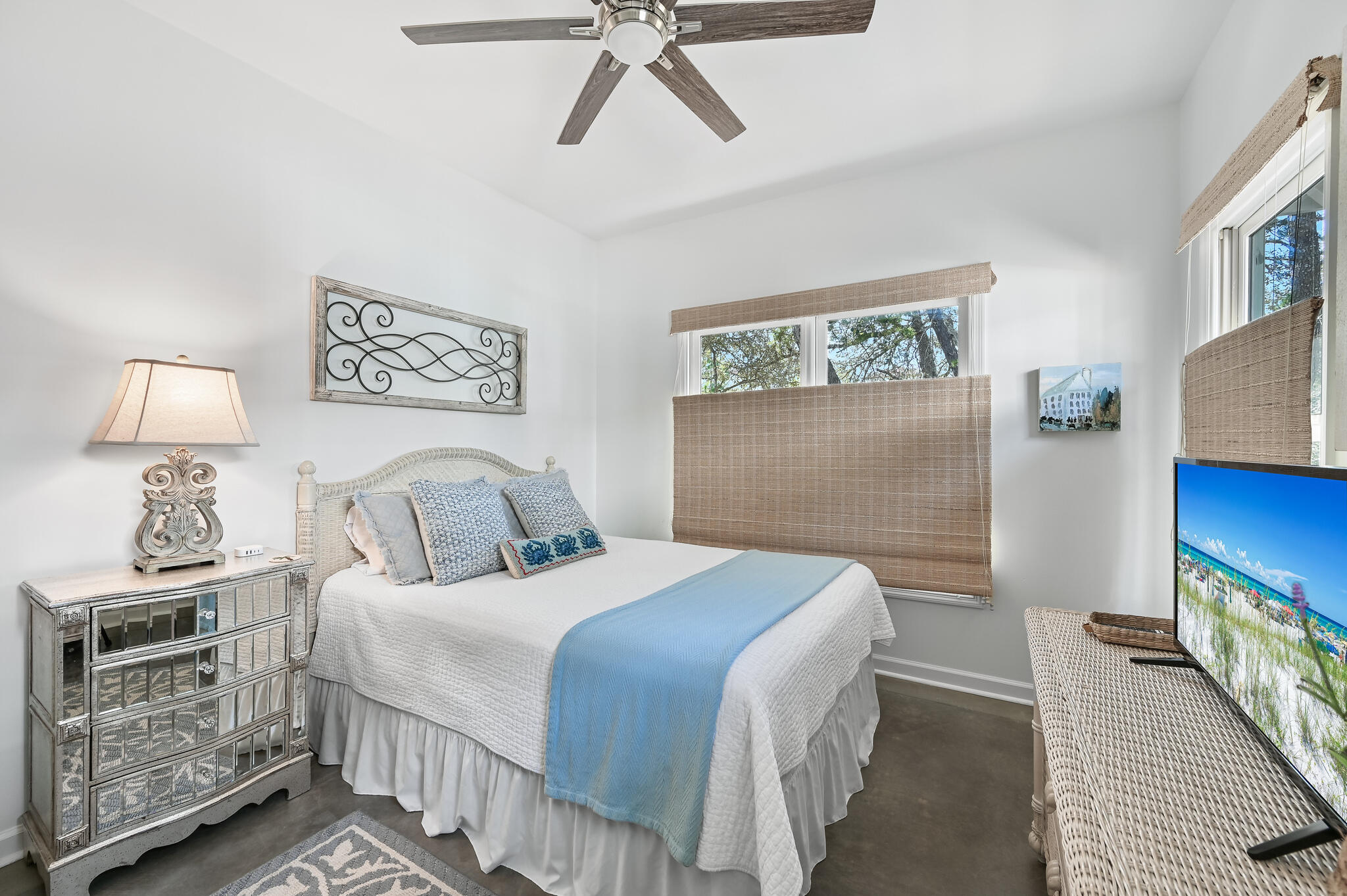 65 Cassine Way Santa Rosa Beach, FL 32459 - Photo 22 of 38 a bedroom with a bed and wooden floor