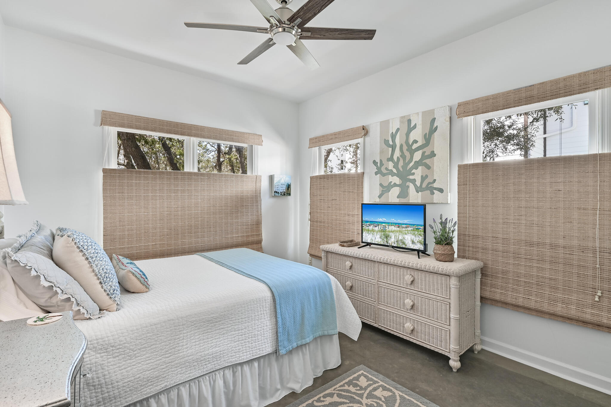 65 Cassine Way Santa Rosa Beach, FL 32459 - Photo 23 of 38 a bedroom with a bed and a dresser