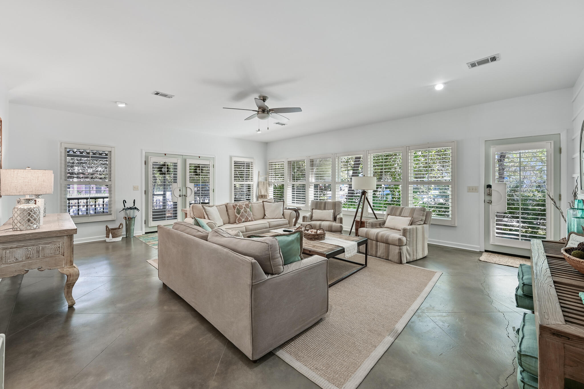65 Cassine Way Santa Rosa Beach, FL 32459 - Photo 7 of 38 a living room with furniture and a large window
