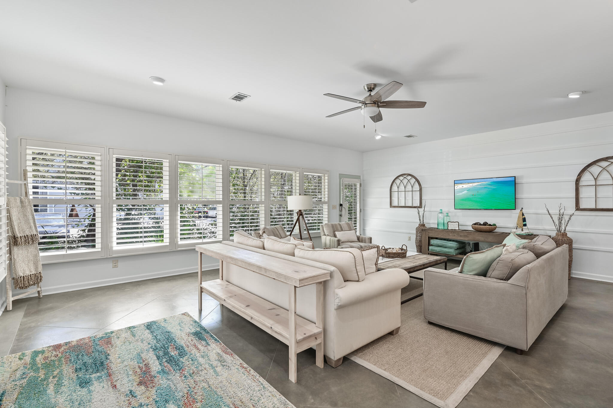 65 Cassine Way Santa Rosa Beach, FL 32459 - Photo 10 of 38 a spacious bedroom with a large bed and a large window