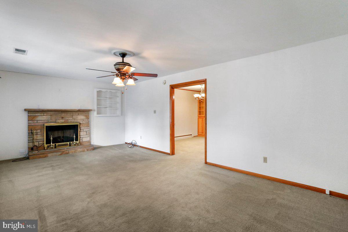 13506 Spriggs Road Hagerstown, MD 21742 - Photo 10 of 43 Living room w/fireplace