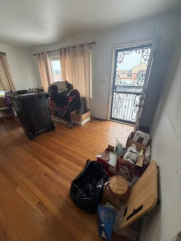 a room with furniture window and a flat screen tv