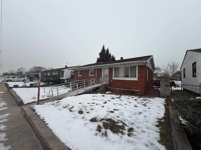 a view of roof deck with a barbeque and wooden stairs