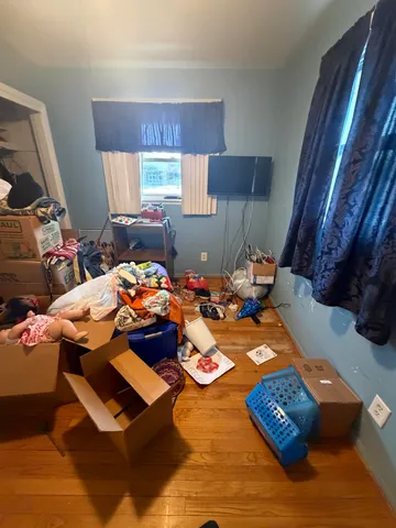 a view of store room with wooden floor
