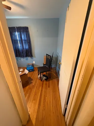 a bathroom with a granite countertop shower and a sink