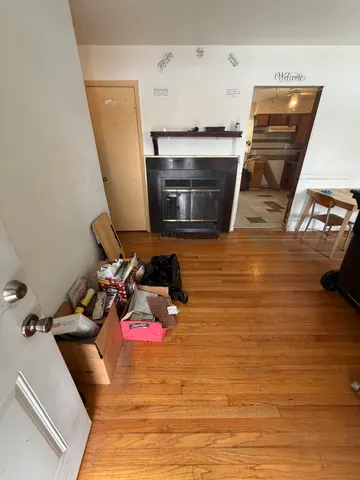 a room with furniture and a fireplace