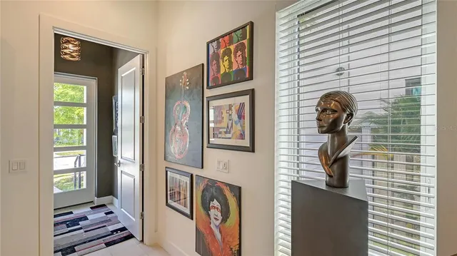 a kitchen with stainless steel appliances kitchen island granite countertop a refrigerator and a stove