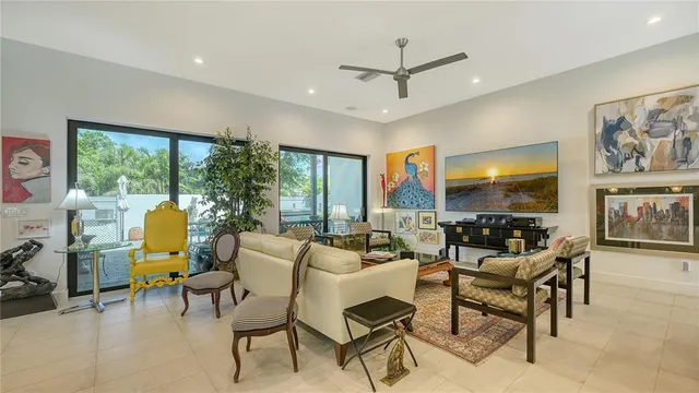 a kitchen with a refrigerator and a table