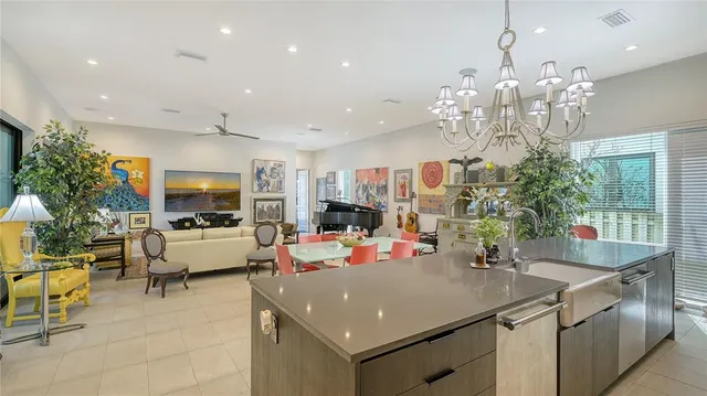 a kitchen with a sink and stove