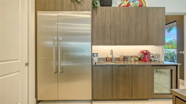 a bedroom with a bed and a table