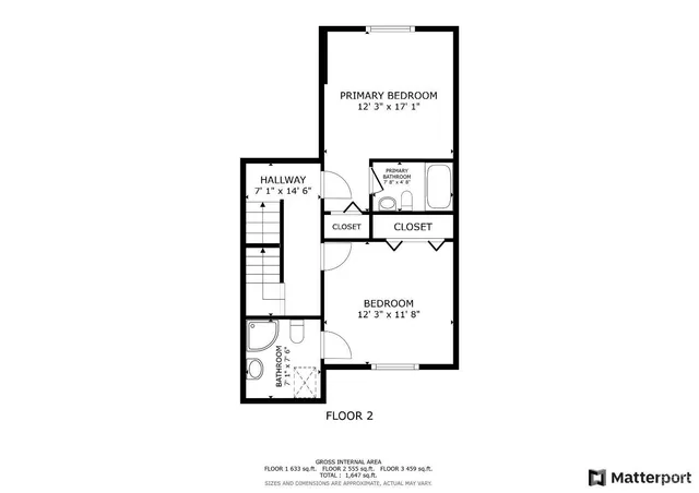 a picture of a bench in front of a wall