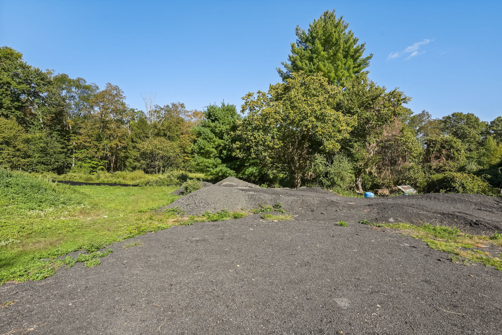 96 Georgetown Road Weston, CT 06883 - Photo 1 of 21 a view of a yard with a tree