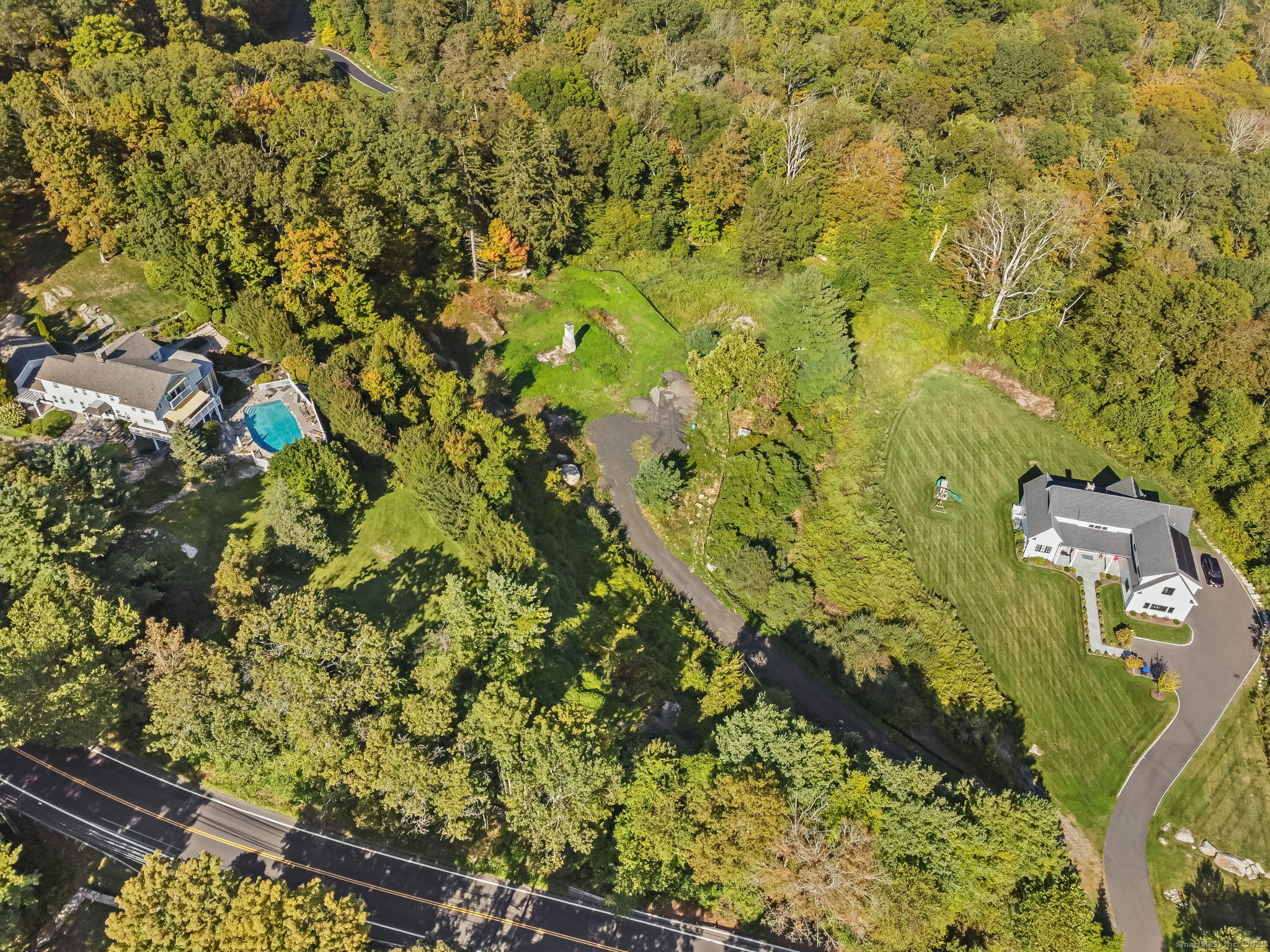 96 Georgetown Road Weston, CT 06883 - Photo 13 of 21 a view of residential house with green space