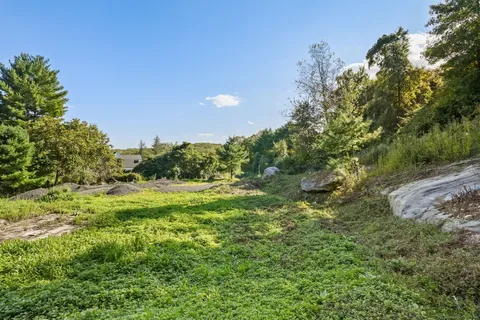 a view of an outdoor space and a yard