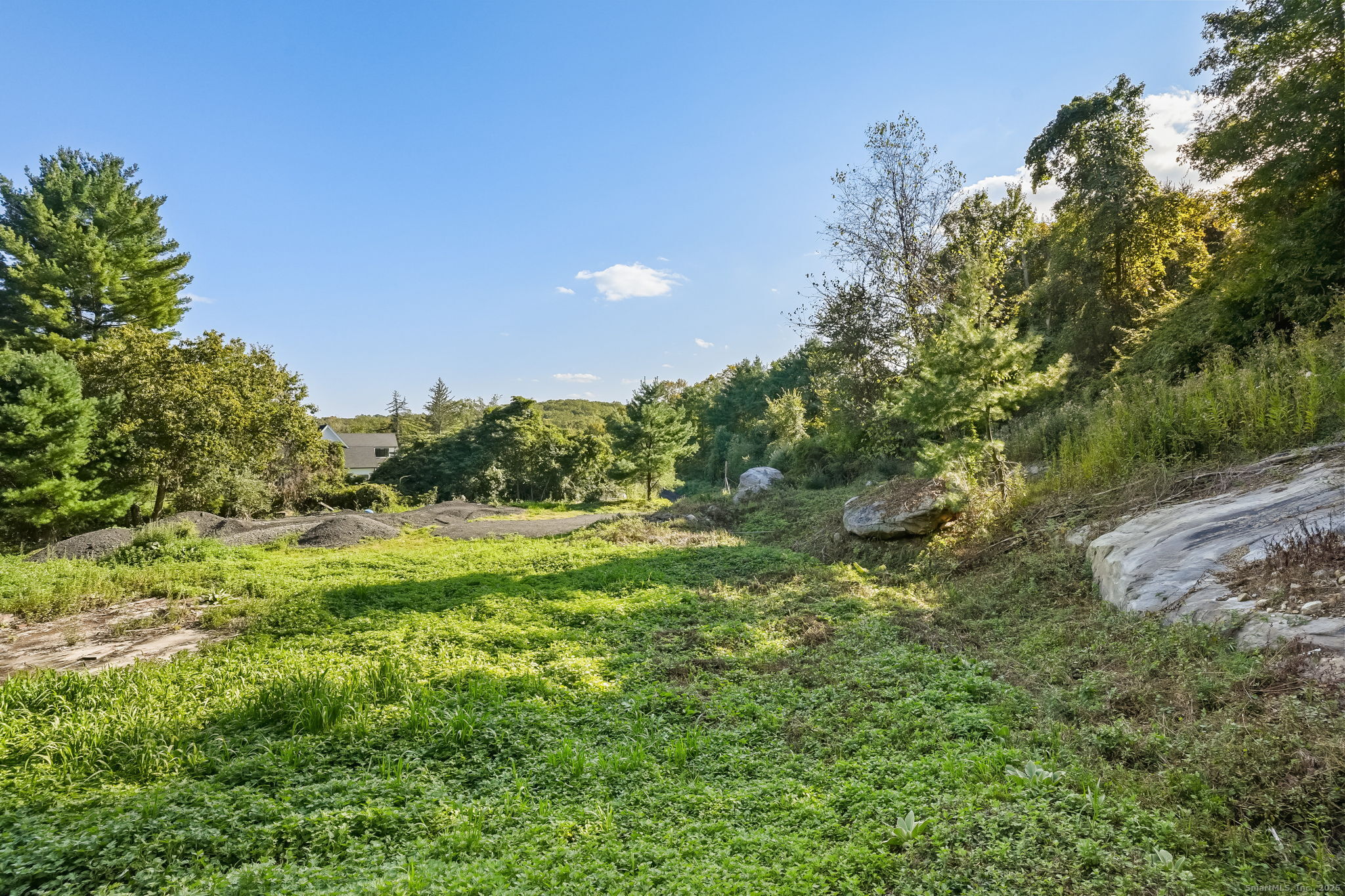 96 Georgetown Road Weston, CT 06883 - Photo 7 of 21 a view of an outdoor space and a yard