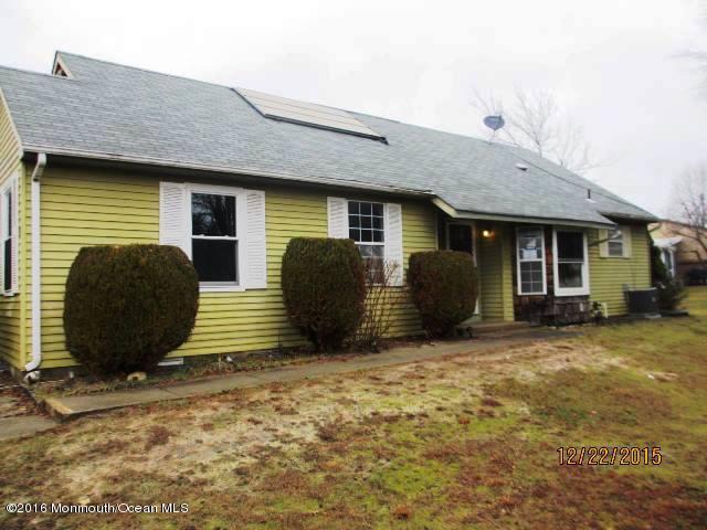 12 Alpine Road, Unit B Manchester Township, NJ 08759 - Photo 1 of 6 a view of a house with a yard and garage