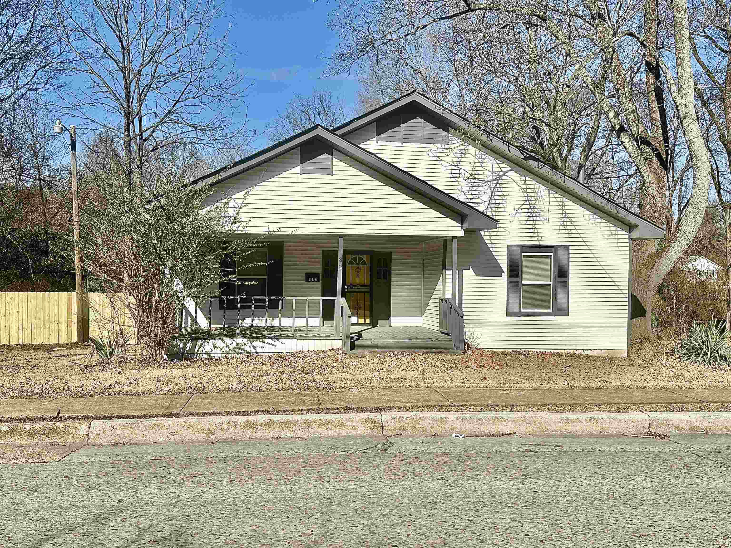182 South Jefferson Street Ripley, TN 38063 - Photo 2 of 22 a front view of a house with garden