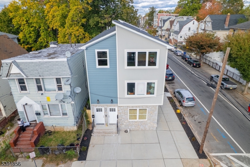 543 13th Avenue Newark, NJ 07103 - Photo 2 of 38 a front view of a house with balcony