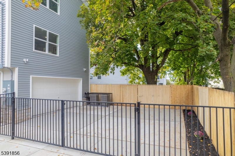 543 13th Avenue Newark, NJ 07103 - Photo 26 of 38 a view of a wooden fence