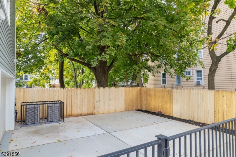543 13th Avenue Newark, NJ 07103 - Photo 30 of 38 a view of backyard and tree