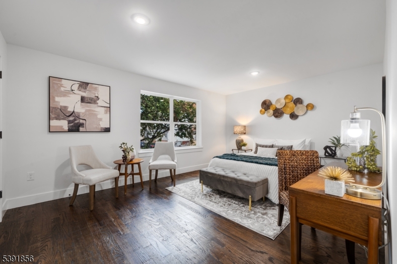 543 13th Avenue Newark, NJ 07103 - Photo 6 of 38 a living room with furniture and wooden floor