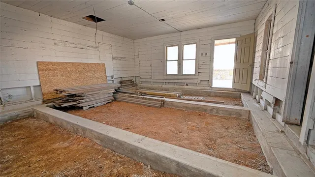 a view of a house with a garden