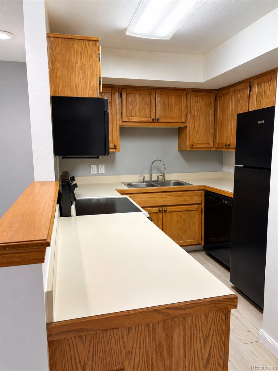 5031 Garrison Street, Unit 104B Wheat Ridge, CO 80033 - Photo 3 of 8