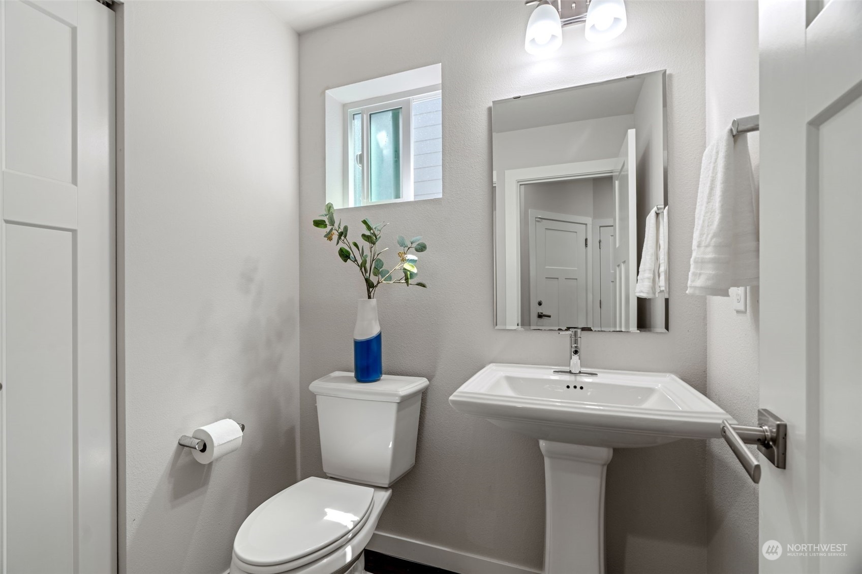 22622 41st Drive Southeast Bothell, WA 98021 - Photo 14 of 34 a bathroom with a sink toilet and mirror