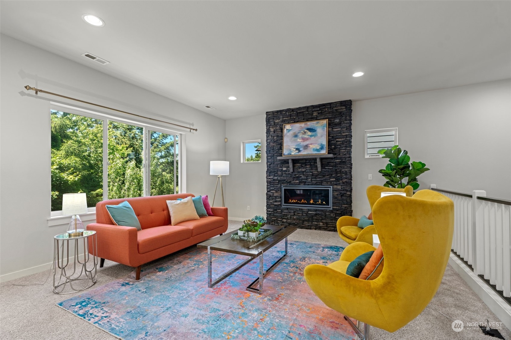 22622 41st Drive Southeast Bothell, WA 98021 - Photo 6 of 34 a living room with furniture plant and a large window