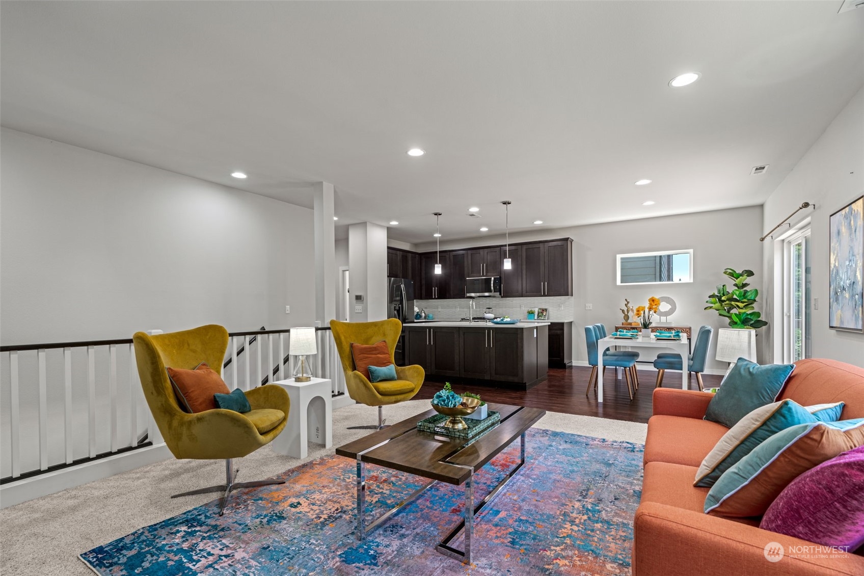 22622 41st Drive Southeast Bothell, WA 98021 - Photo 8 of 34 a living room with furniture and a rug