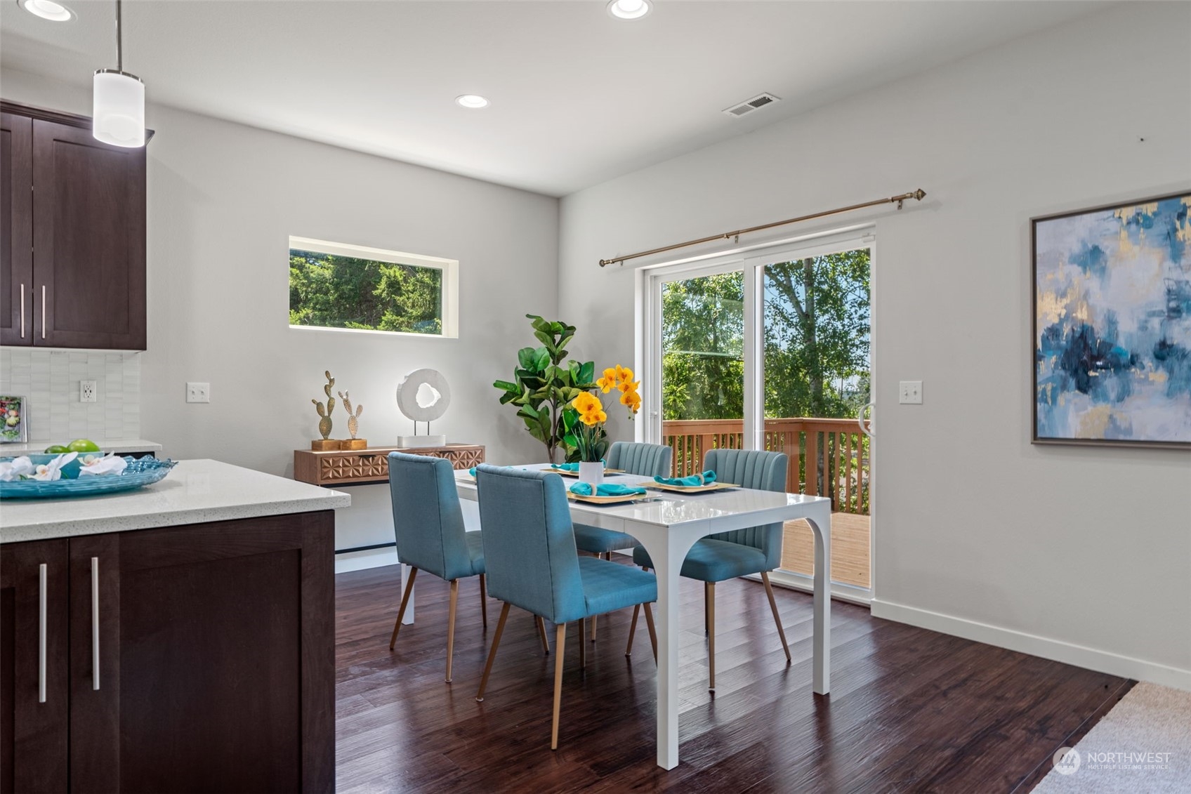 22622 41st Drive Southeast Bothell, WA 98021 - Photo 10 of 34 a view of a dining room with furniture window and wooden floor