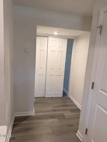 a view of a patio with a chairs and table in the patio