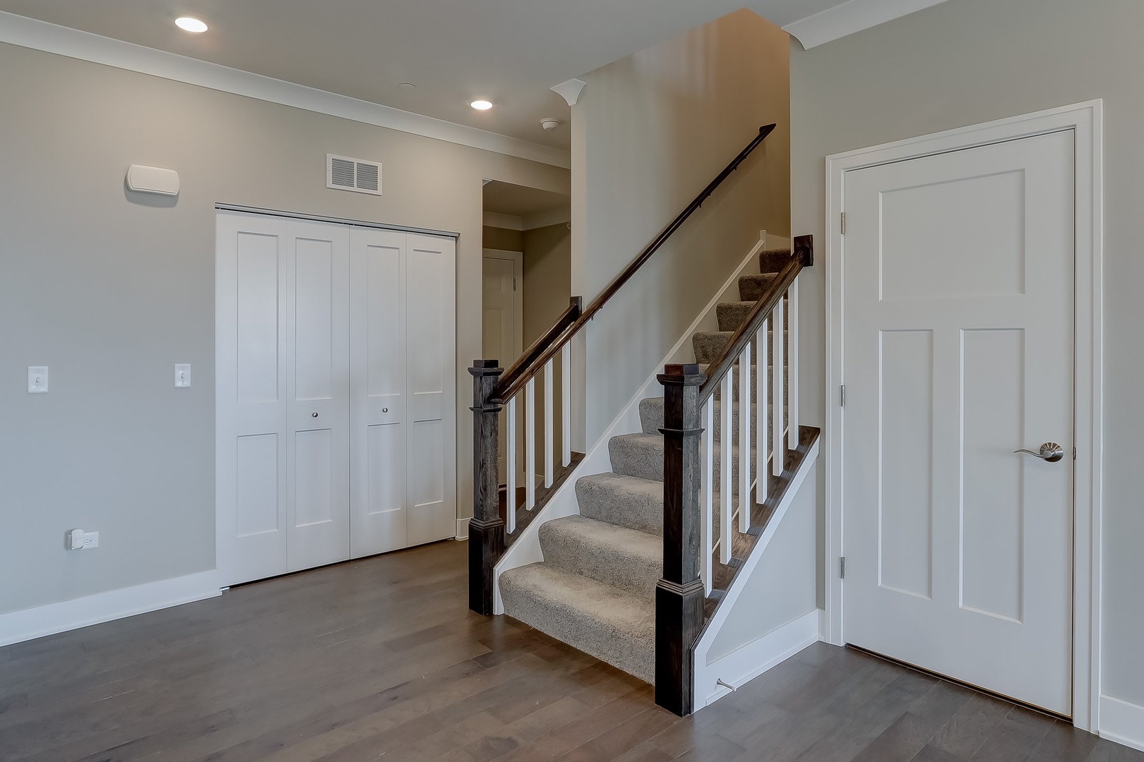 15455 Amelia Circle Lockport, IL 60441 - Photo 2 of 29 a view of staircase with white walls and stairs