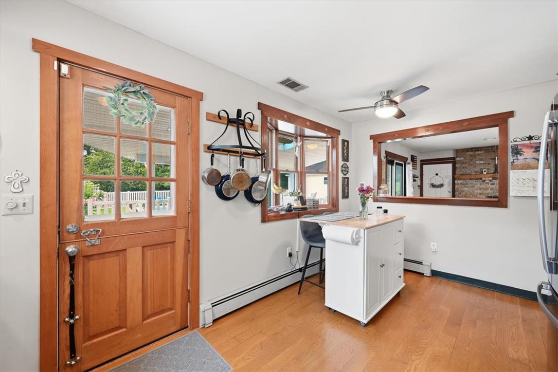 7722 Sechler Road New Tripoli, PA 18066 - Photo 20 of 58 Rich wood trim frames the windows and Dutch door in this inviting kitchen space.