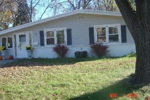 1535 Maple Street Glenview, IL 60025 - Photo 1 of 1 front view of a house with a yard