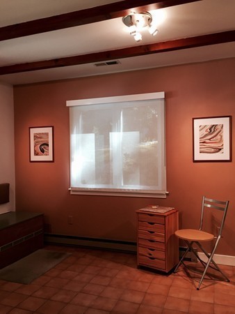 301 Montague Road Leverett, MA 01054 - Photo 25 of 30 a view of a livingroom with chair and a window