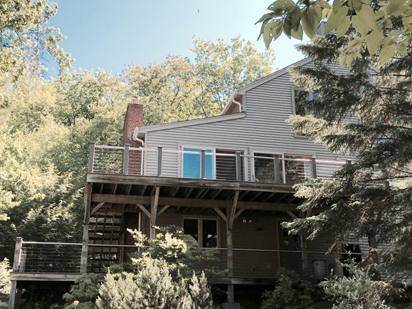 301 Montague Road Leverett, MA 01054 - Photo 4 of 30 a front view of a house with balcony