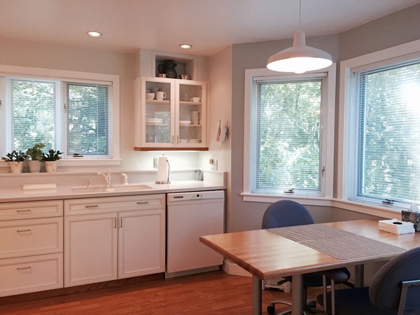 301 Montague Road Leverett, MA 01054 - Photo 9 of 30 a kitchen with a table chairs sink and cabinets